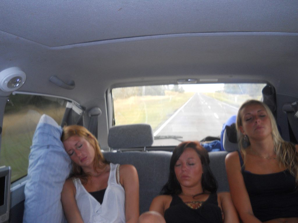 Three girls sleeping in the car in the middle of the desert in Australia. Rescued in the middle of the desert