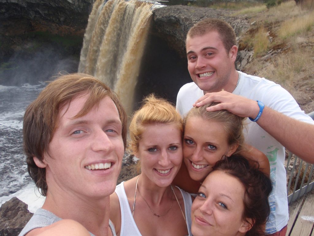 David Simpson and the gang at a waterfall in the middle of the desert in Australia. Rescued in the middle of the desert