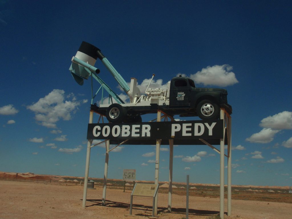 Coober Pedy sign during the road trip in the middle of the desert in Australia. Rescued in the middle of the desert