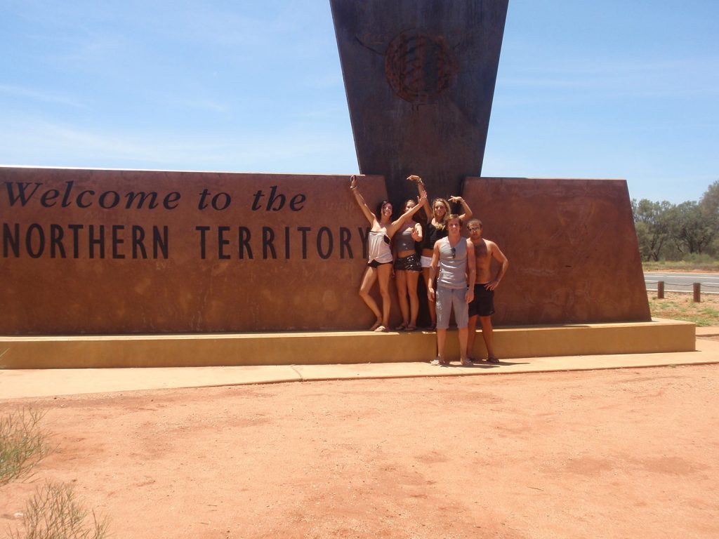 David Simpson and the gang at Northern Territory sign in Australia. Rescued in the middle of the desert