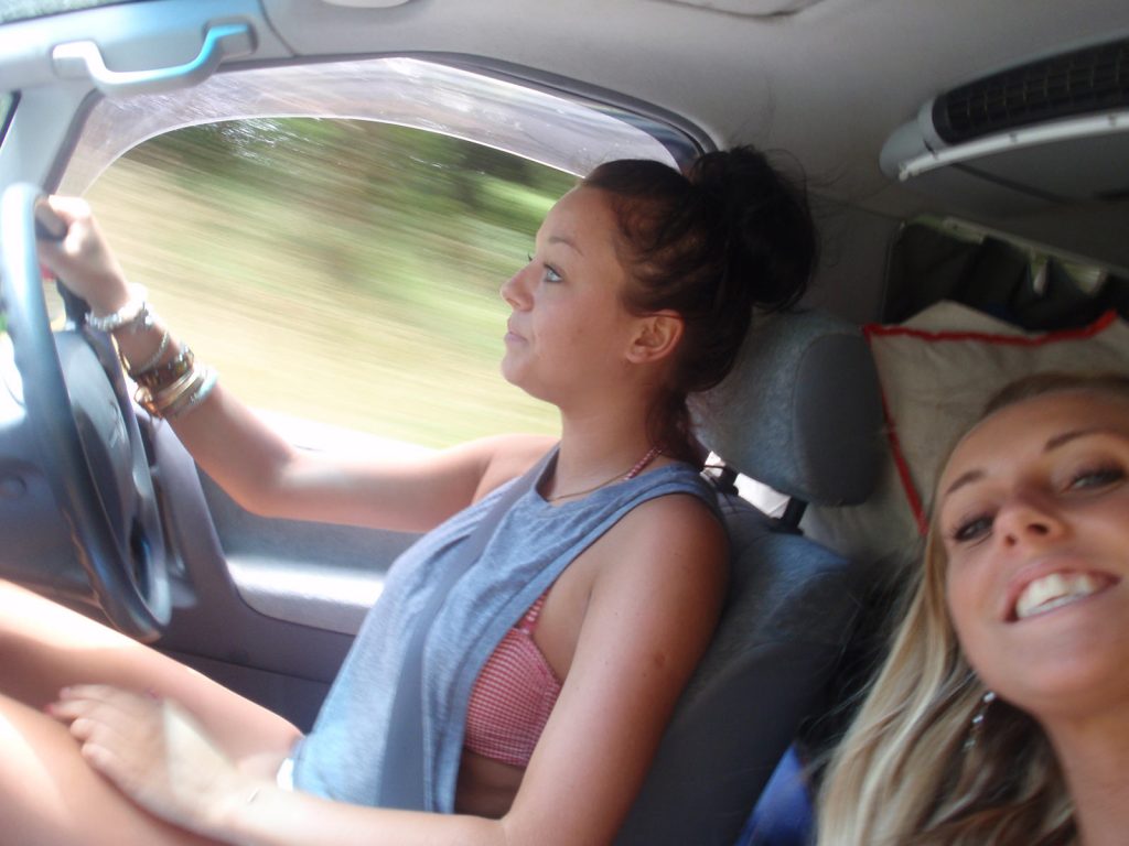 Two girls during the road trip in the middle of the desert in Australia. Rescued in the middle of the desert