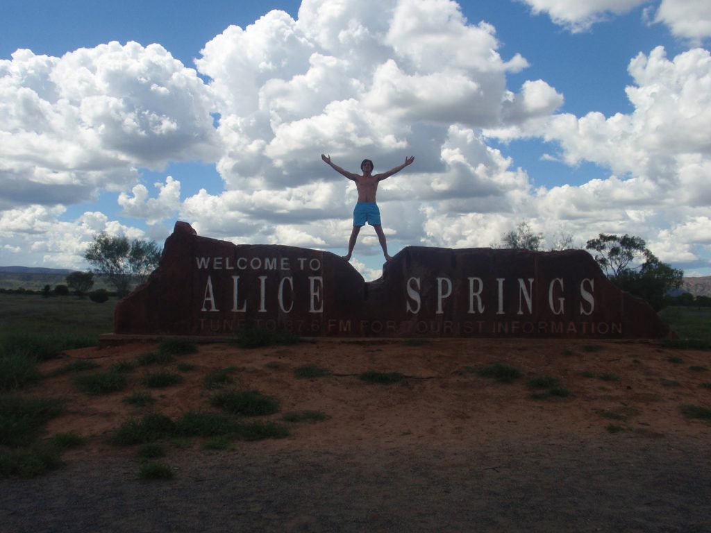 David Simpson at Alice Springs sign in Australia. Rescued in the middle of the desert