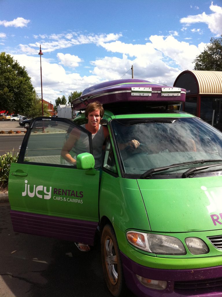 David Simpson and the green rental car in Australia. Rescued in the middle of the desert
