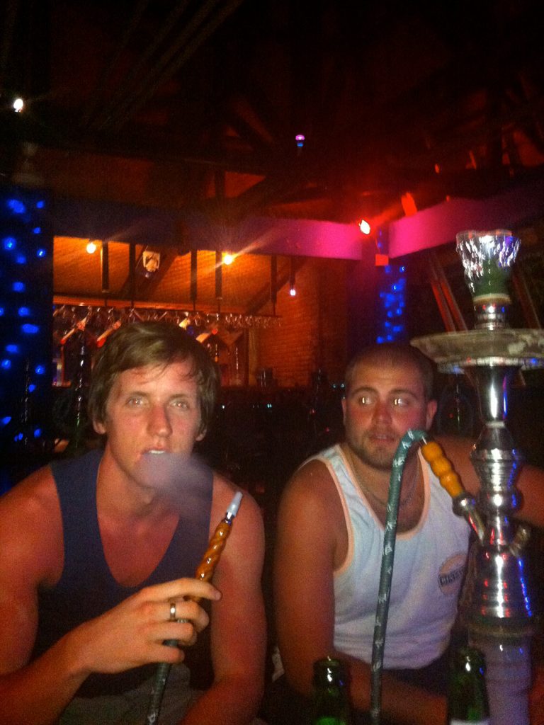 David Simpson and a guy trying a shisha in first taste of Asia. My first taste of Asia