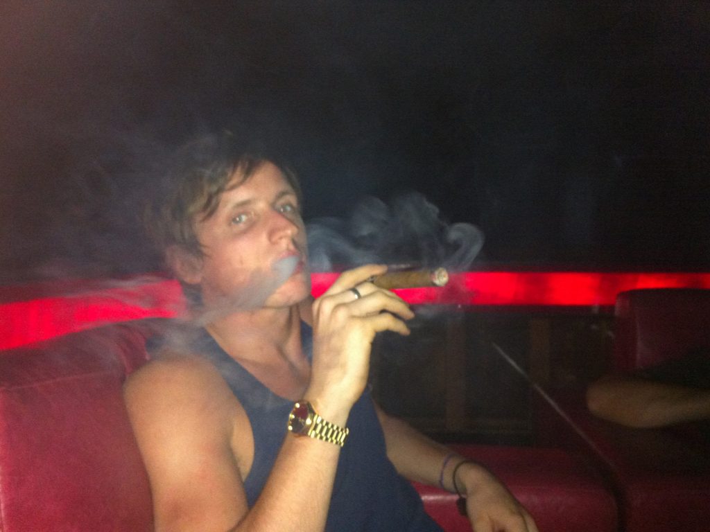 David Simpson smoking a cigar in Bali. My first taste of Asia