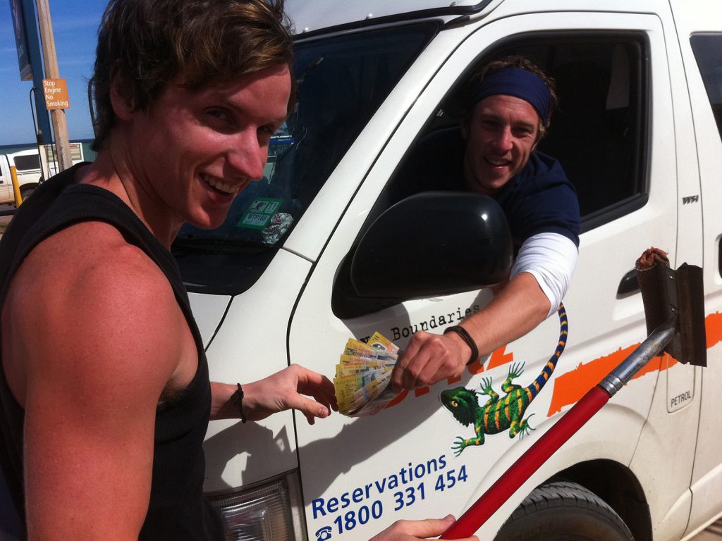 David Simpson getting money from driver in West Coast, Australia. Hitting a cow on the west coast road trip