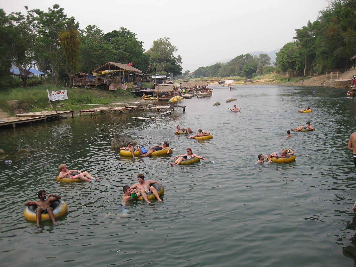People tubing in Vang Vieng in Laos. Laos most dangerous attraction