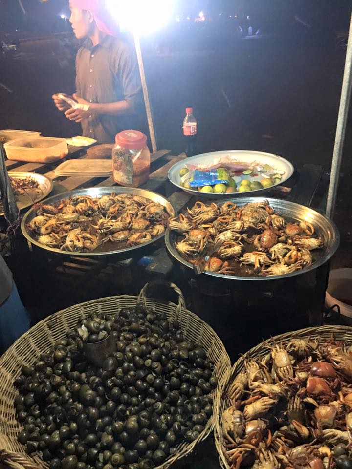 Crabs and snails in food stalls in Cambodia. The craziest food tour in Cambodia