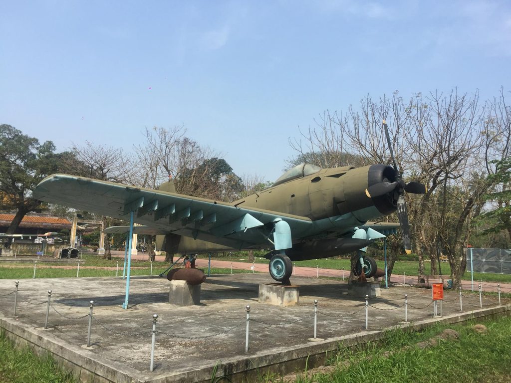 WWII fighter plane display in Hue, Vietnam. Crashing twice and friendly locals