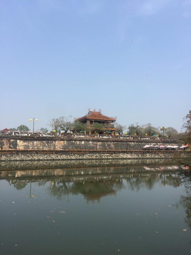 Vietnamese architecture by the river in Hue, Vietnam. Crashing twice and friendly locals