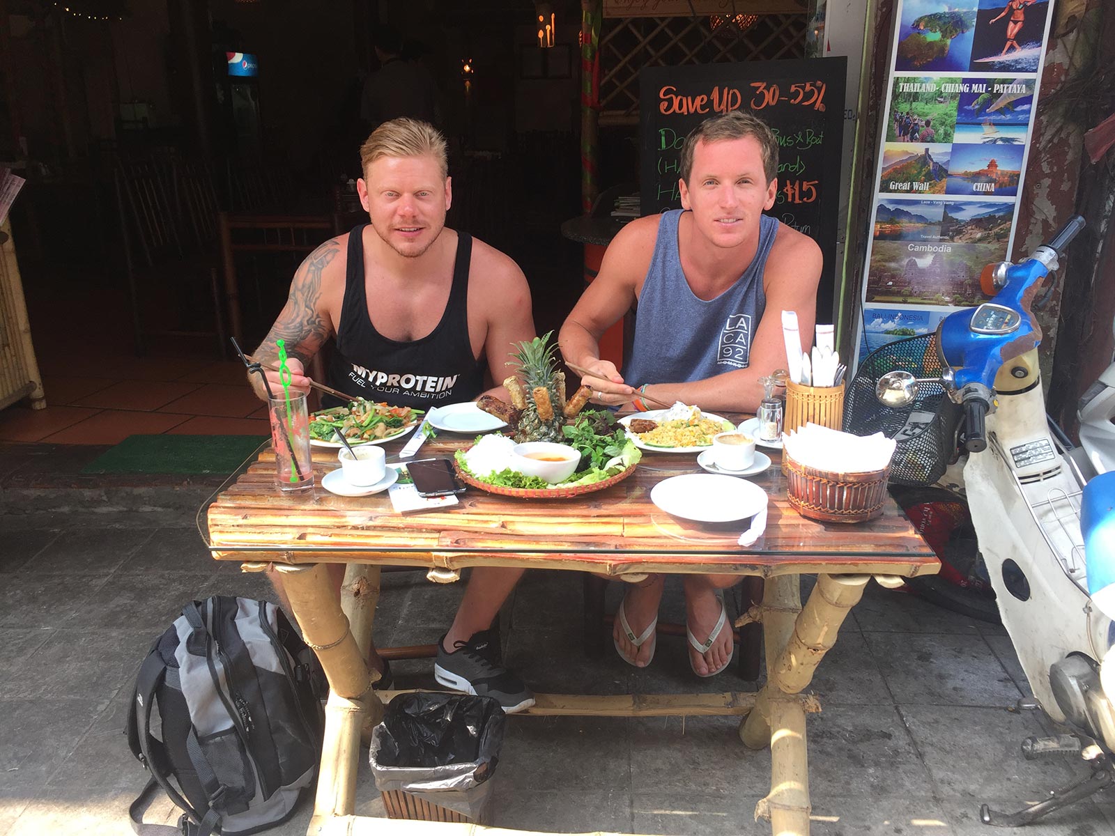 David Simpson eating lunch with a friend in Hanoi, Vietnam. Buying bikes and checking out Hanoi