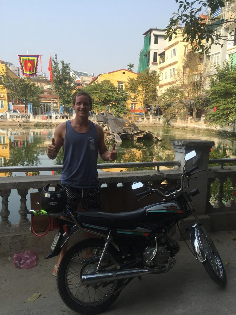 David Simpson with a motorbike in Hanoi, Vietnam. Buying bikes and checking out Hanoi