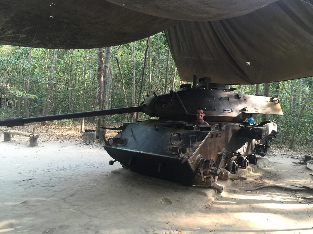 David Simpson inside a tank at a shooting range in Ho Chi Minh, Vietnam. Stabbings & tunnels in Ho Chi Minh