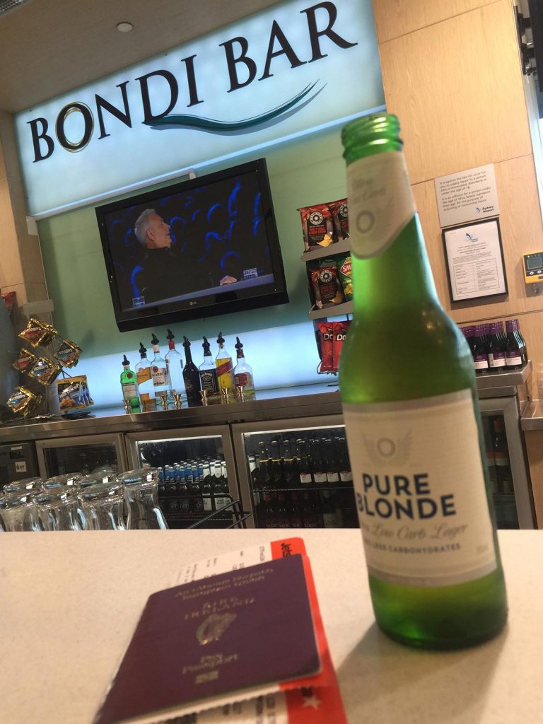 Bottle of beer and passport at Bondi Bar in Hanoi, Vietnam. Everyone's worst travel nightmare happened today