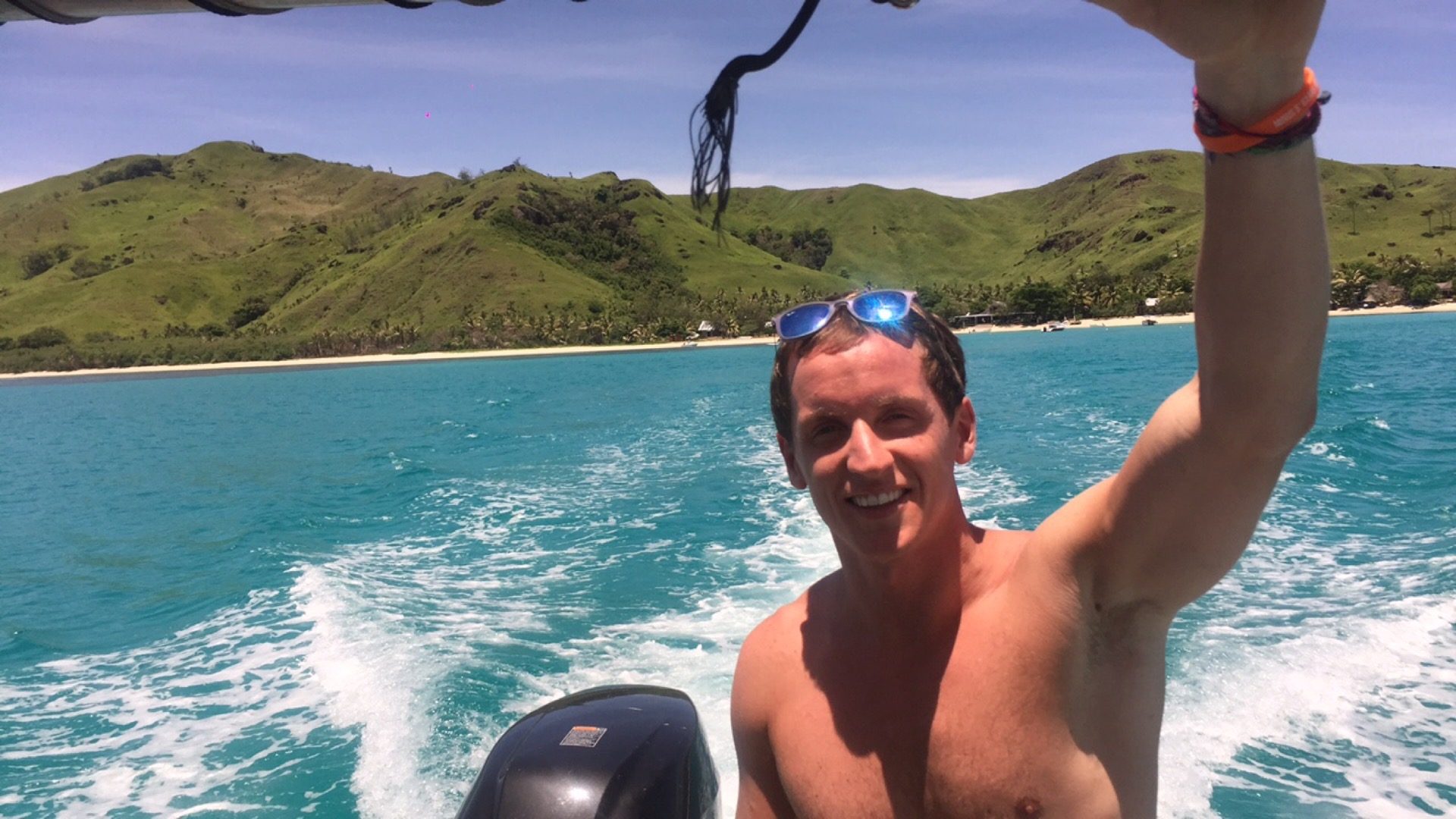 David Simpson riding a boat in Mantaray, Fiji. Bowls on Barefoot Manta