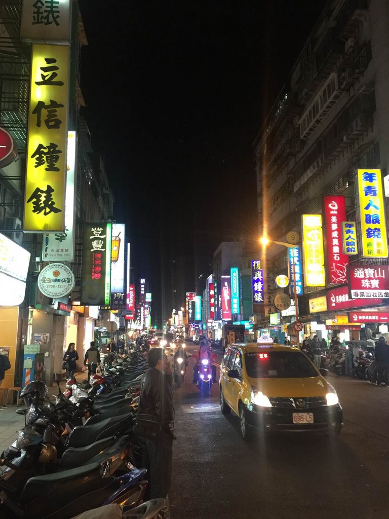 Street of Taipei at night in Taiwan. Street food in Taiwan
