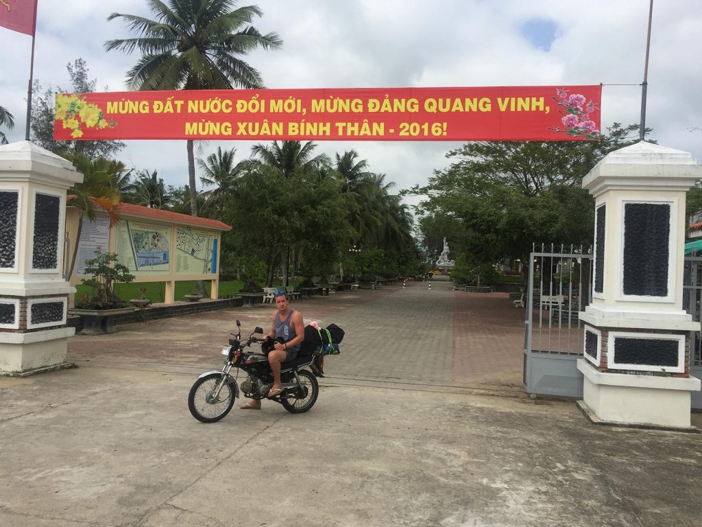 David Simpson riding a motorbike in Quy Nhon, Vietnam. The Vietnamese clubs