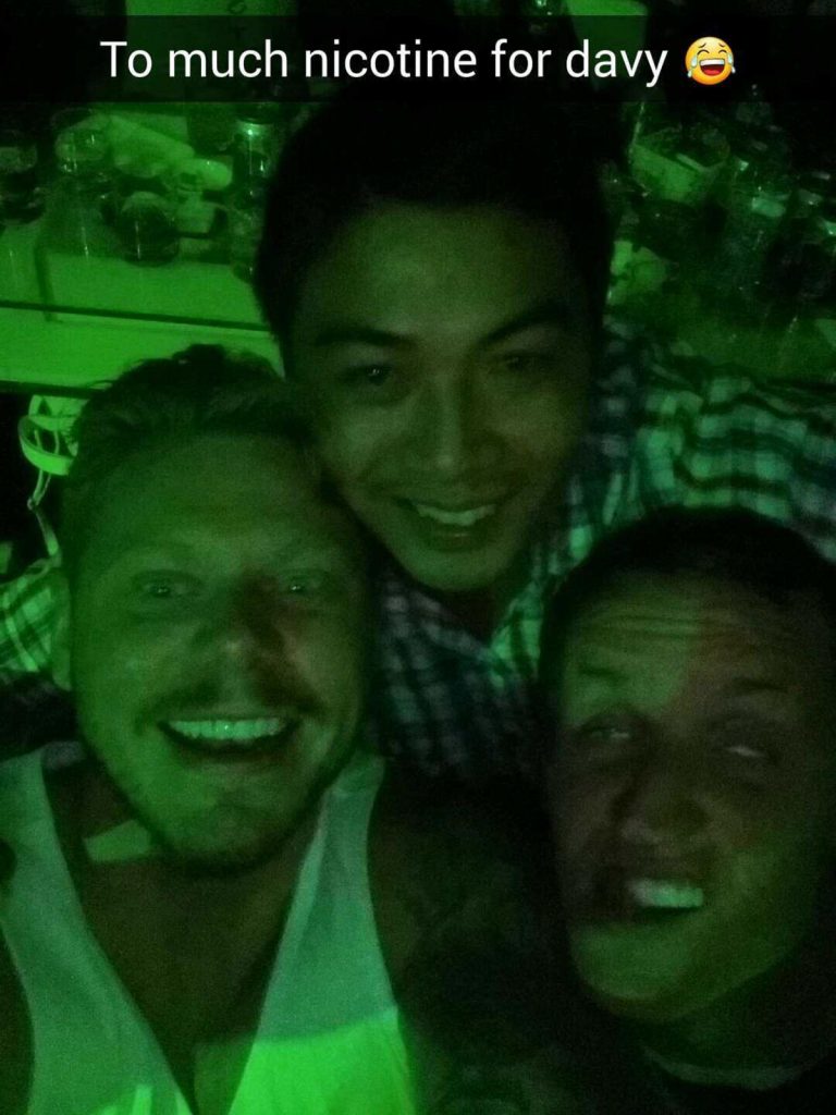David Simpson and a friend with a local at a club in Quy Nhon, Vietnam. The Vietnamese clubs