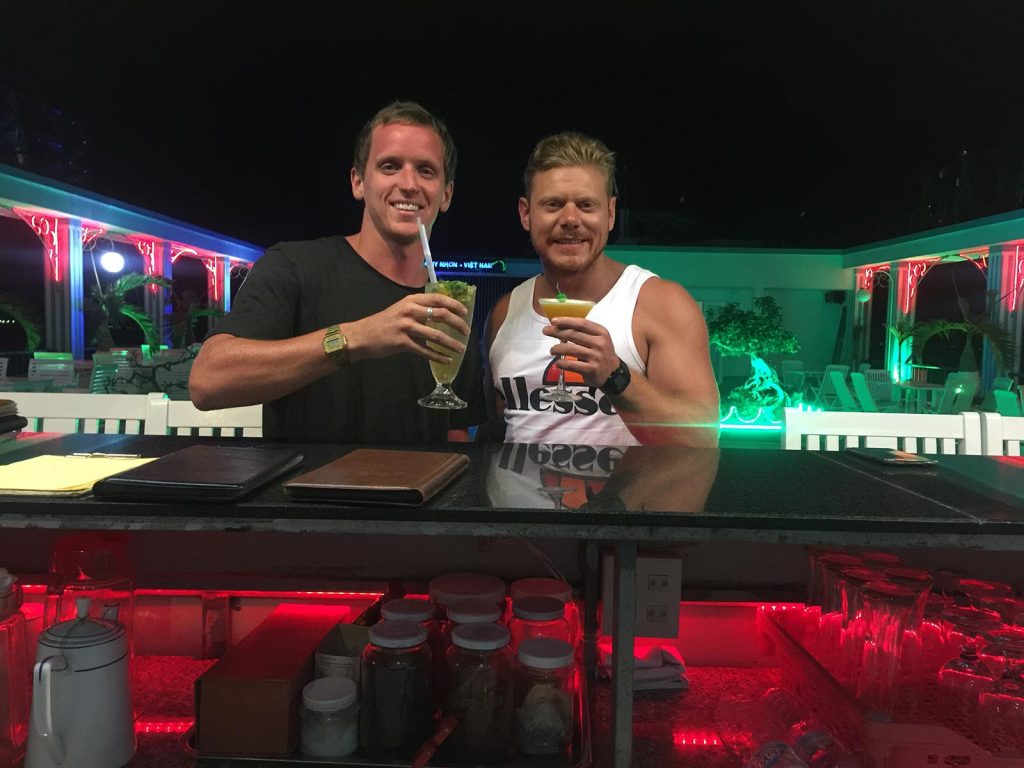 David Simpson and a friend drinking at a club in Quy Nhon, Vietnam. The Vietnamese clubs