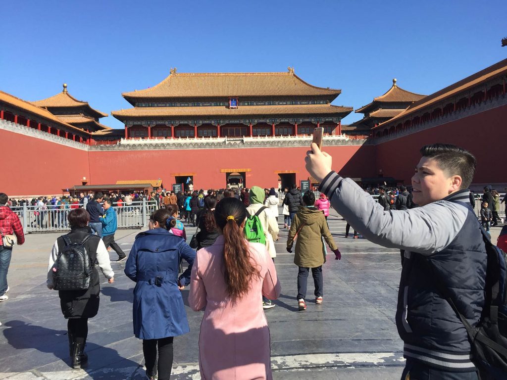 Tourists in The Forbidden City in Beijing, China. Forbidden City and Hutongs
