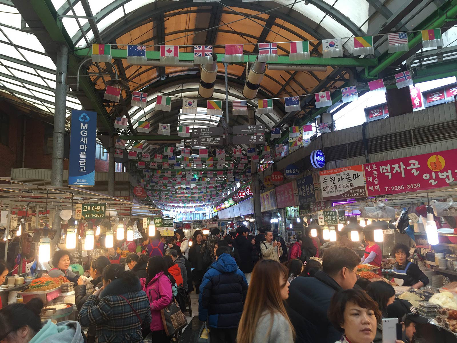 Patrons at food stalls in Seoul, South Korea. Life and Seoul of Korea