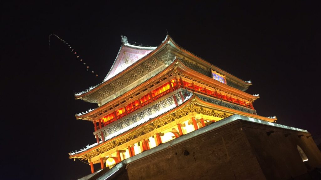 A lighted traditional Chinese architecture at night in Xi'an, China. Checking out Xi'an