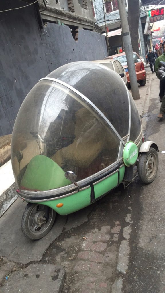 A covered tricycle in Xi'an, China. Checking out Xi'an