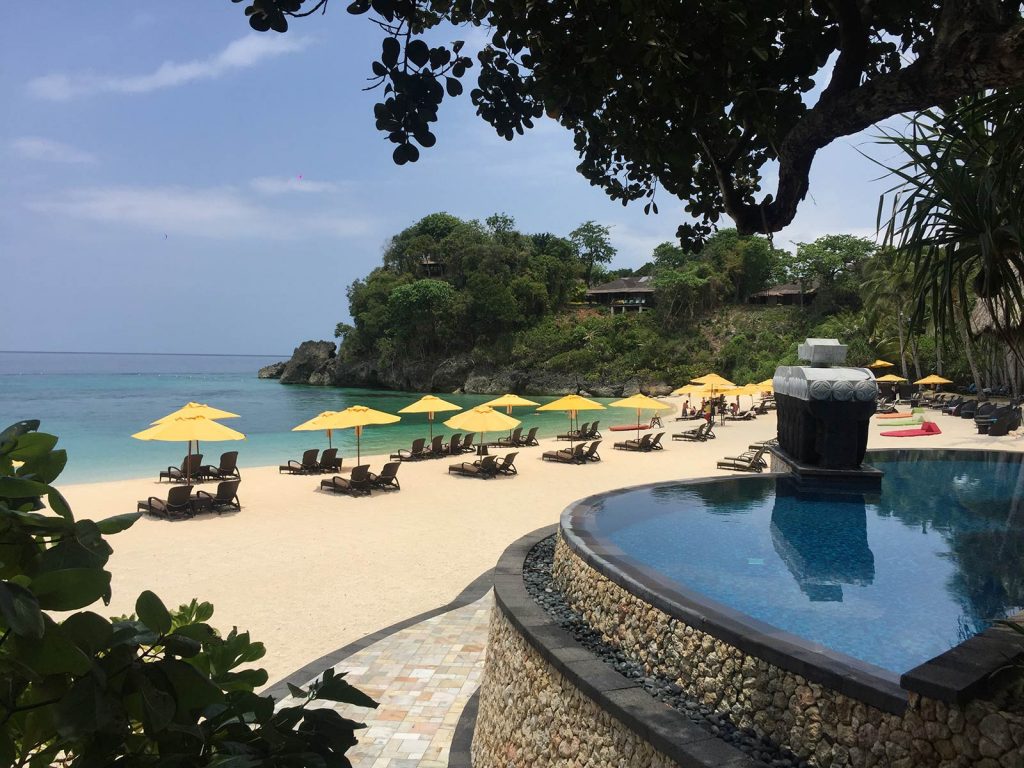 Beach umbrellas in Boracay, Philippines. A week at the Shangri-La Resort, Boracay