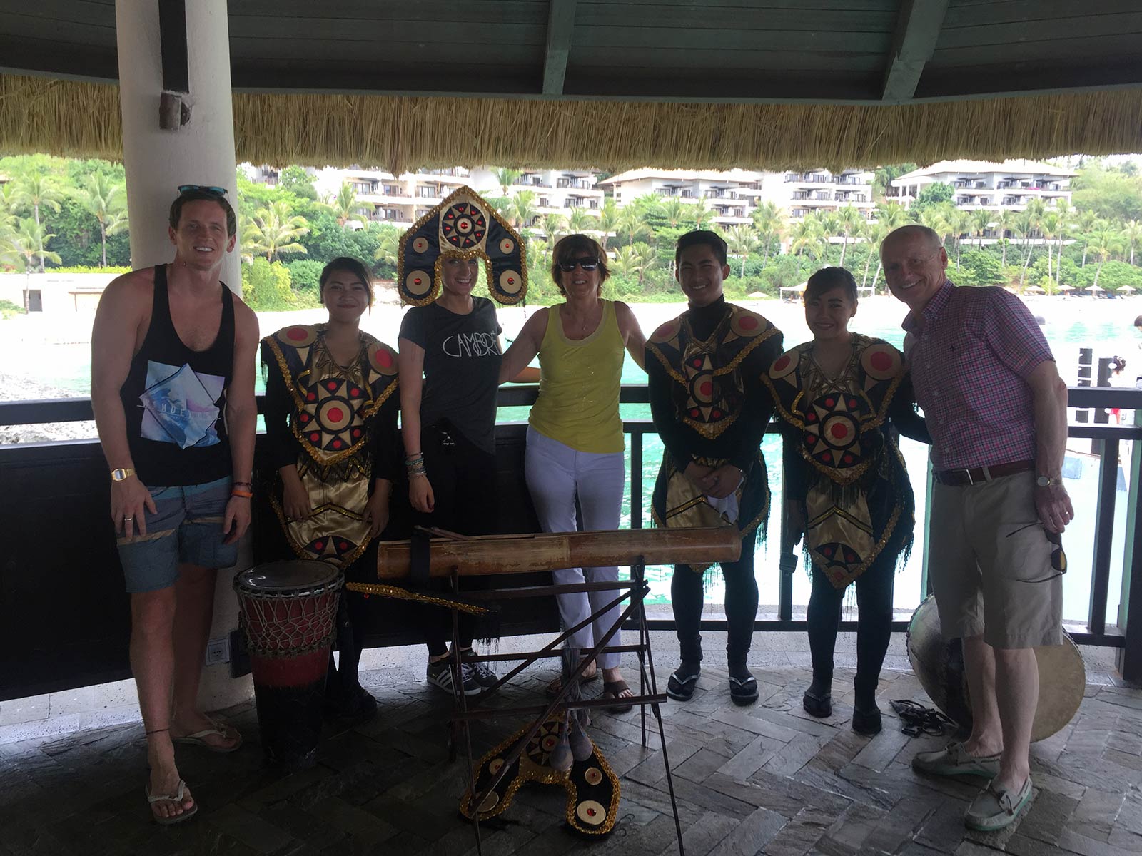 David Simpson and family with local tribal dancers in Boracay, Philippines. A week at the Shangri-La Resort, Boracay