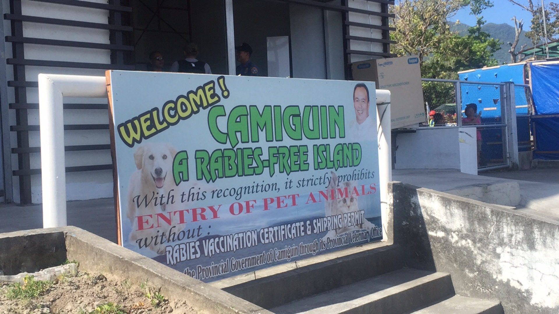 Anti-rabies sign in Camiguin, Philippines. White Island on Camiguin