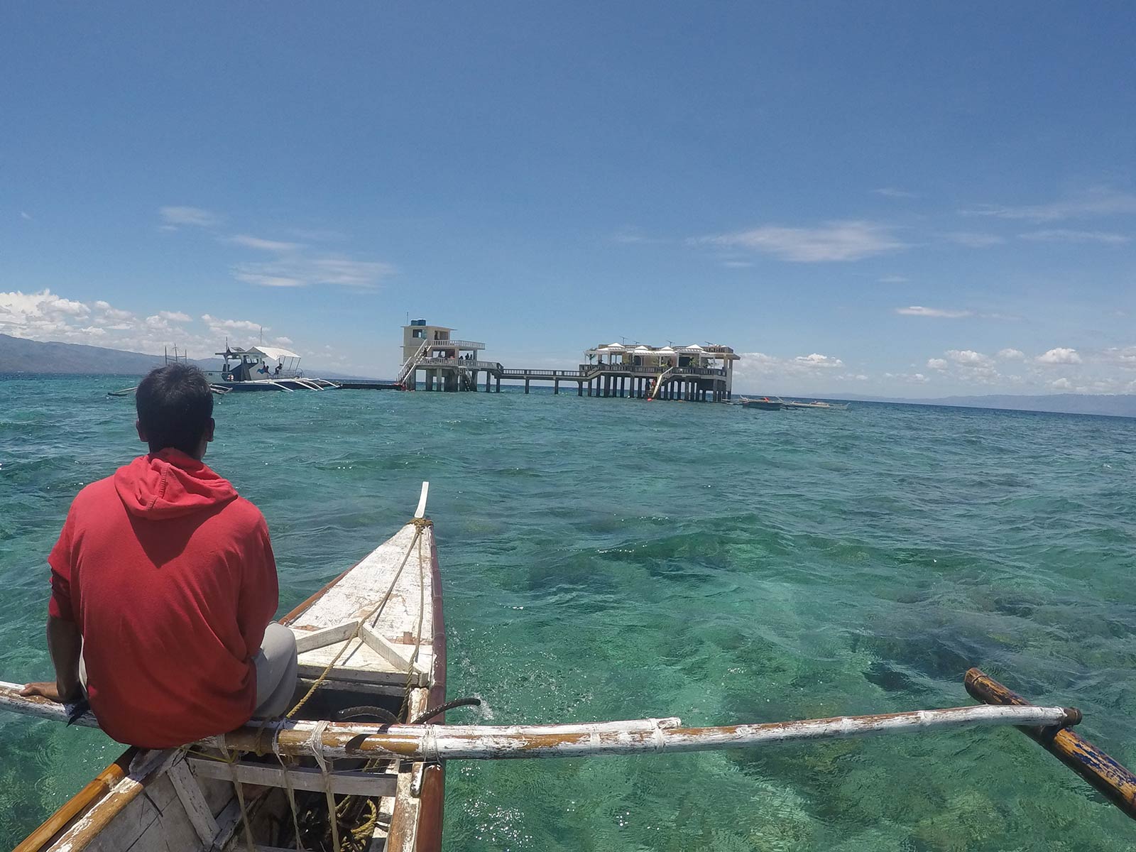Approaching the building on stilt at Manjuyod Sandbar in Dumaguete, Philippines. Turtles at Apo Island & Dumaguete