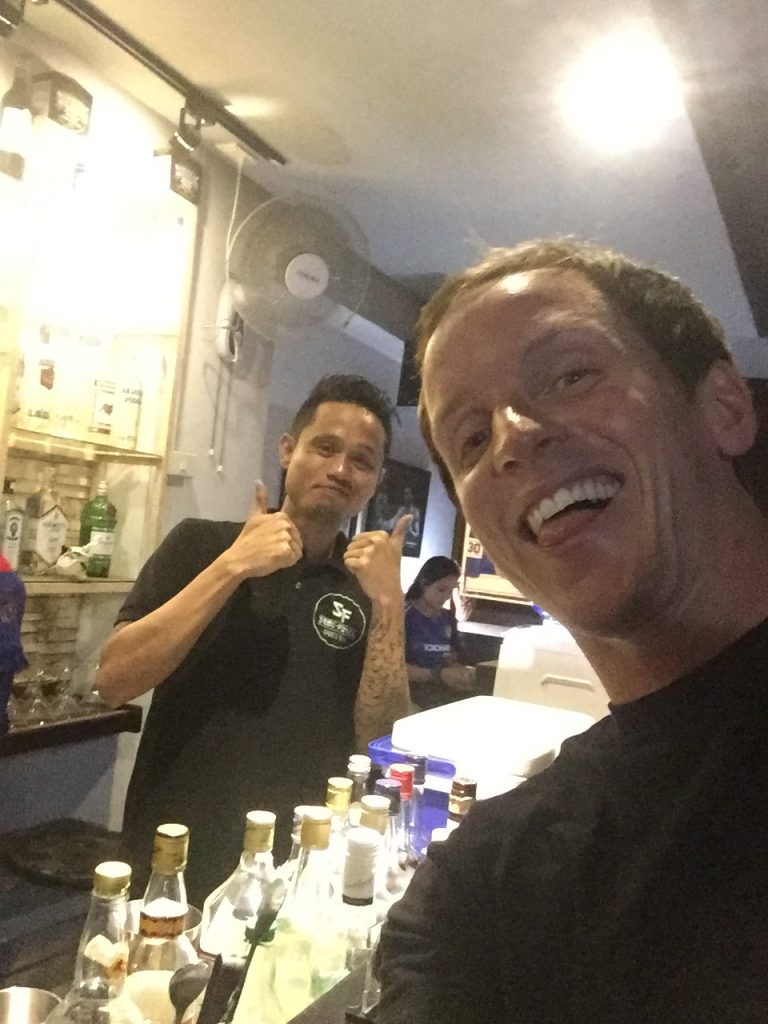 David Simpson with local bartender in Oslob, Philippines. Regrettably swimming with Whale Sharks