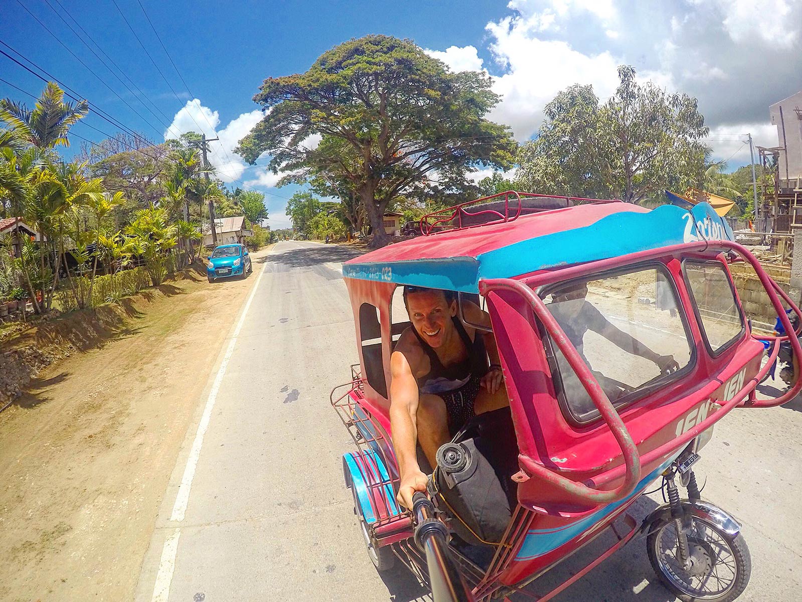 David Simpson riding the motorcycle taxi in Siquijor, Philippines. Friendly locals and Siquijor