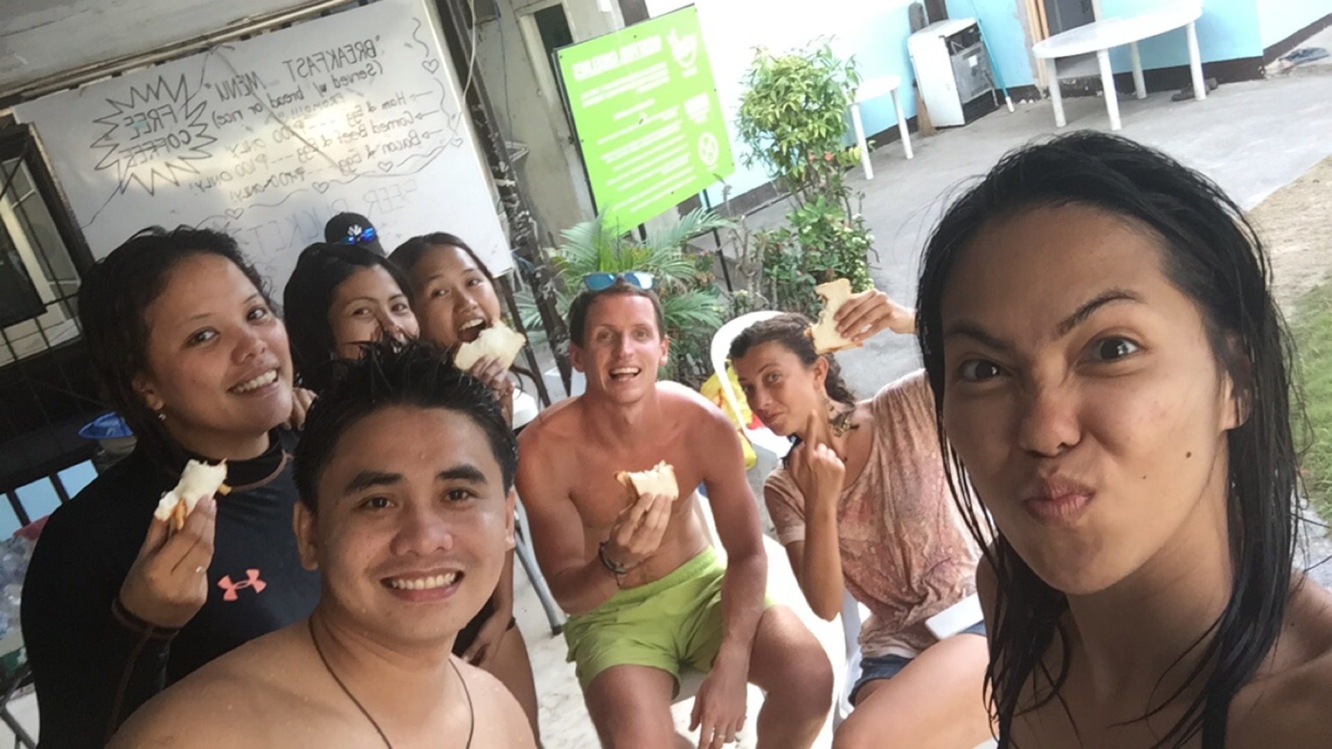 David Simpson and locals at pool party in Siquijor, Philippines. Friendly locals and Siquijor