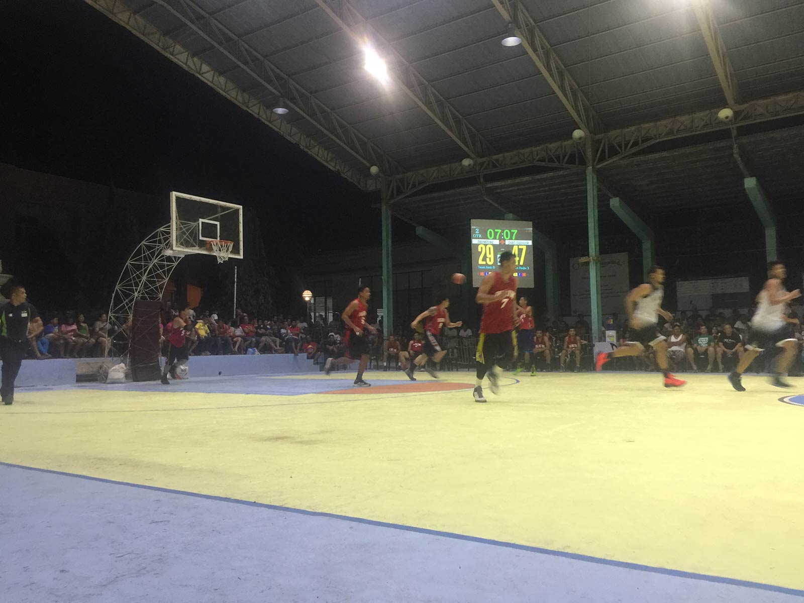 Basketball game at night in Siquijor, Philippines. Friendly locals and Siquijor
