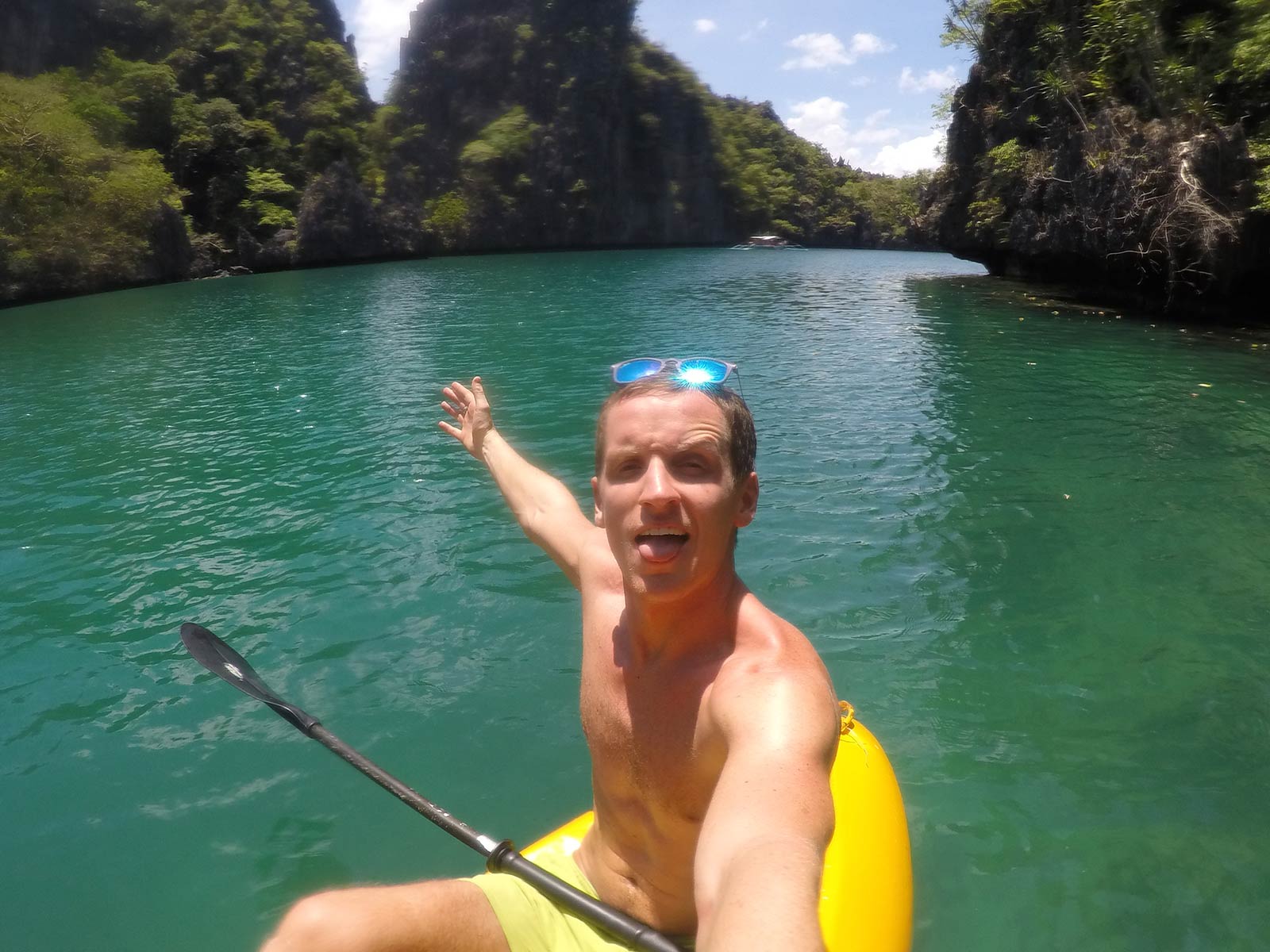 David Simpson paddling around the island in El Nido, Philippines. Paradise in Palawan, El Nido