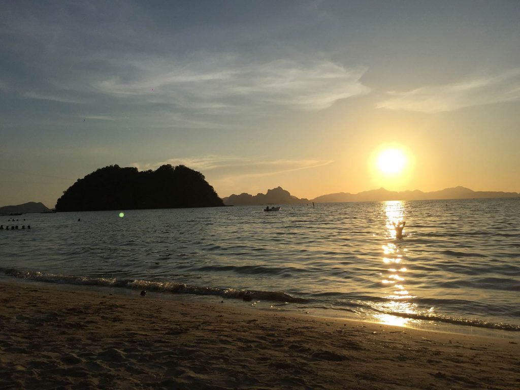 Sunset by the beach in Nacpan, Philippines. The best beach in the world all to myself