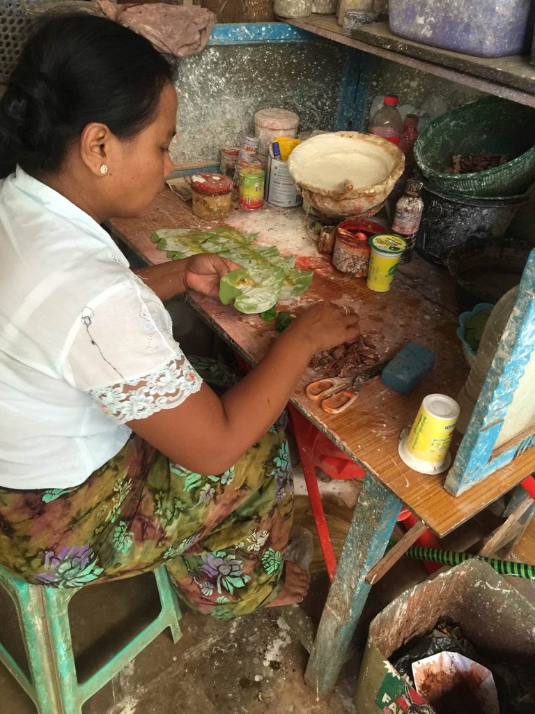 Woman making betel nut chew for selling in Nyaungshwe, Myanmar. Trains, temples & Bagan, The highlights of Myanmar