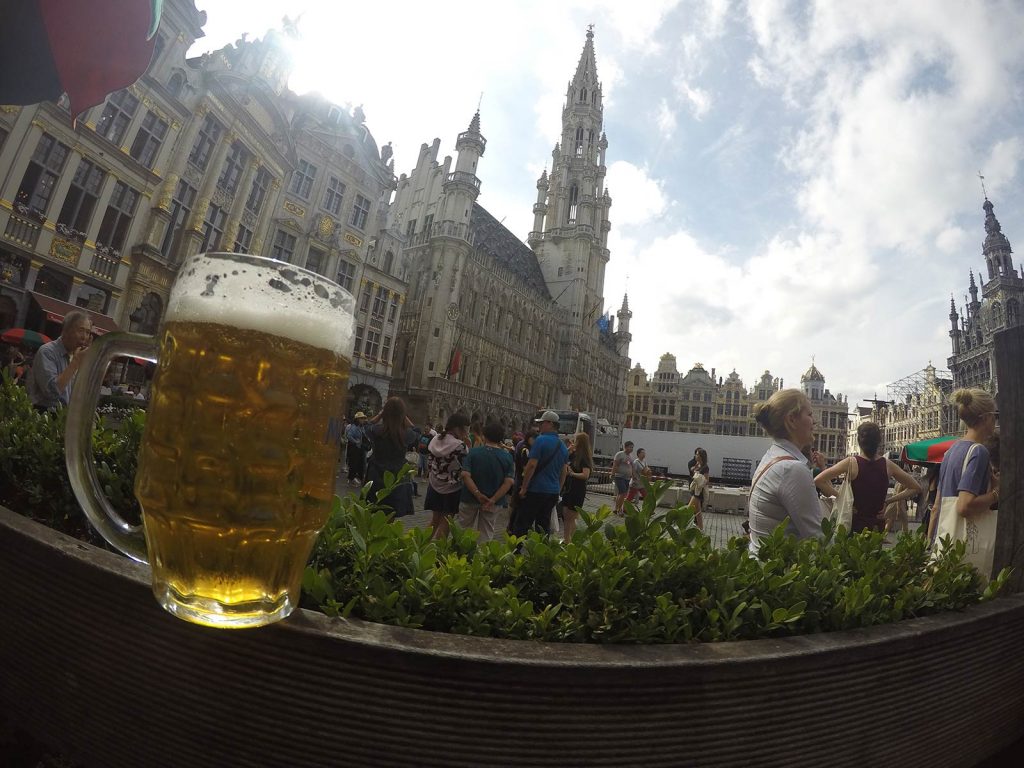 A mug of beer and Gothic architecture in Brussels, Belgium. Safaris in Dubai & waffles in Brussels