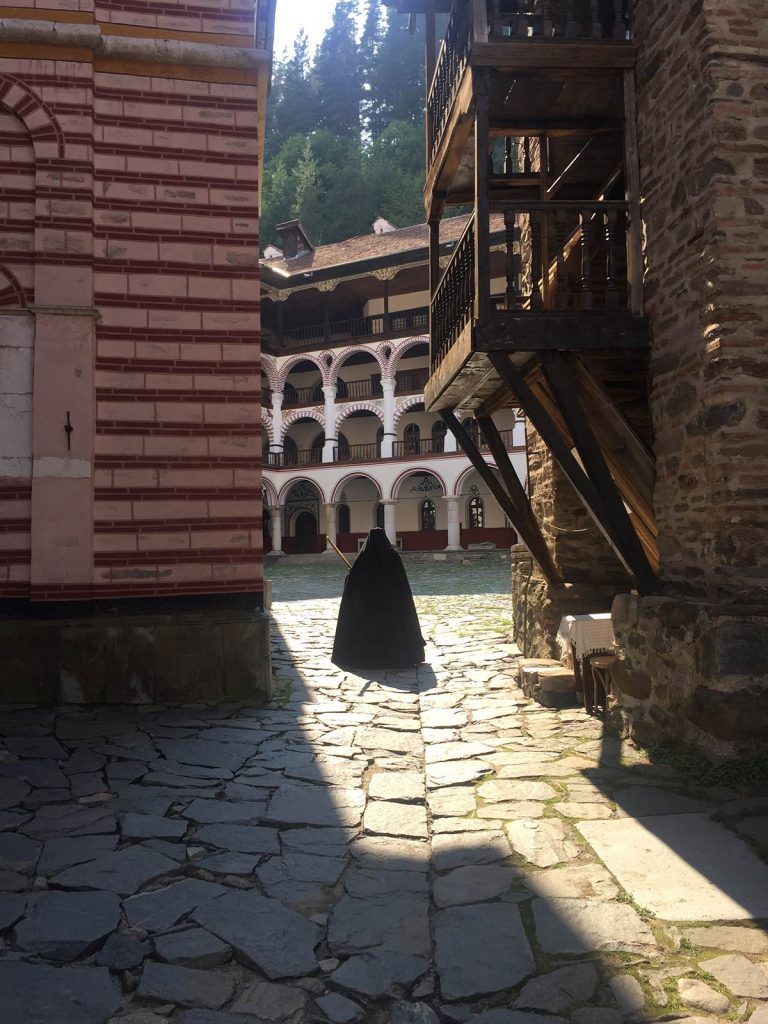 Woman in black at the monastery in Sofia, Bulgaria. My Balkans trip summed up in photos