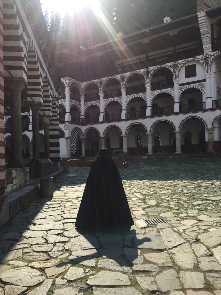 Woman in black at the monastery in Sofia, Bulgaria. My Balkans trip summed up in photos