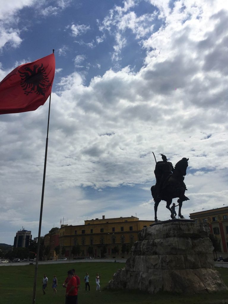 Flag and monument in Tirana, Albania. My Balkans trip summed up in photos