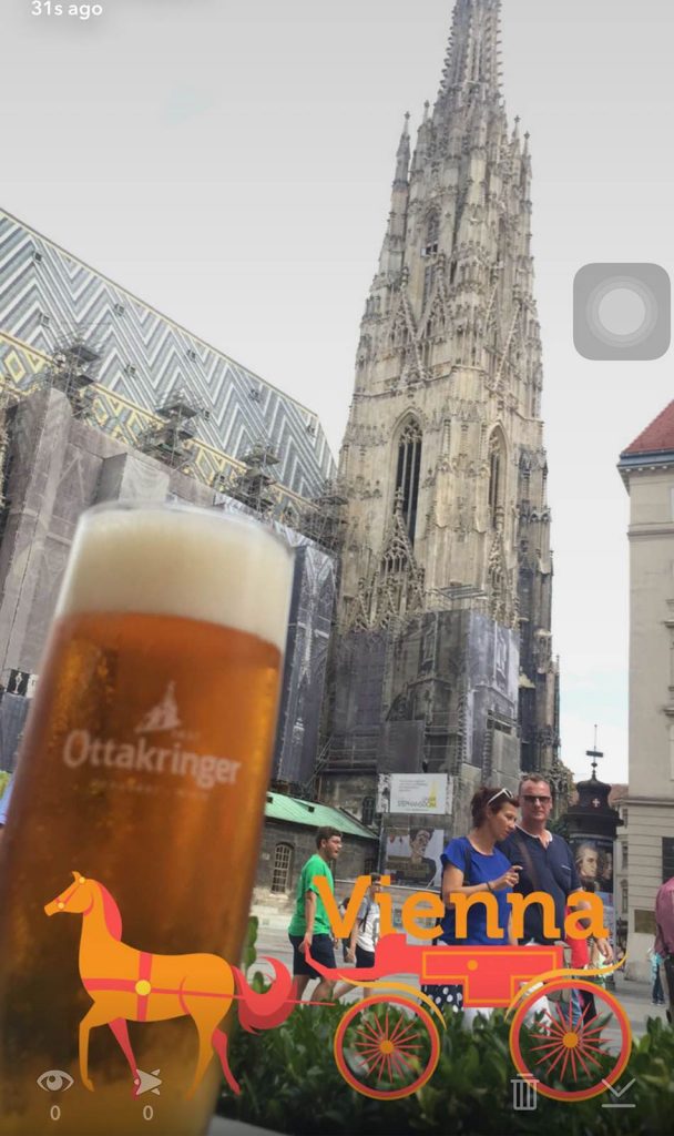 Tall glass of beer outside cathedral in Vienna, Austria. My Eastern European trip summed up in photos