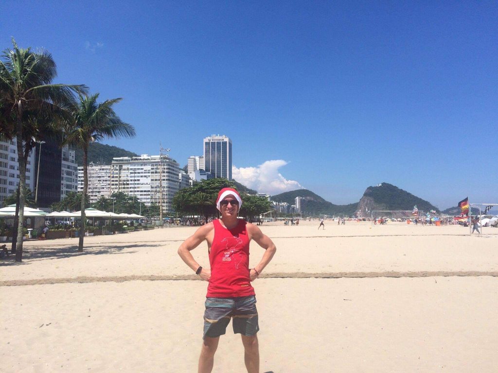 David Simpson at the Copacabana beach in Rio de Janeiro, Brazil. Friends, steak & Copacabana, a perfect Christmas in Rio
