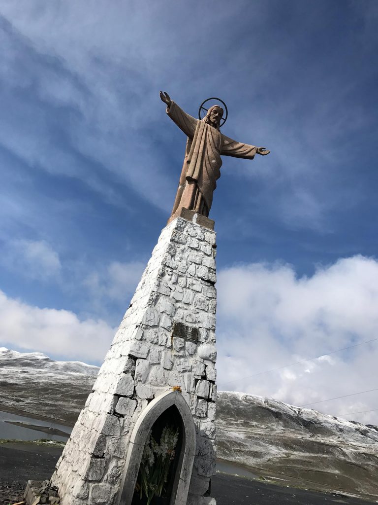 Jesus Christ statue in Bolivia. Cycling Death Road & Full Guide