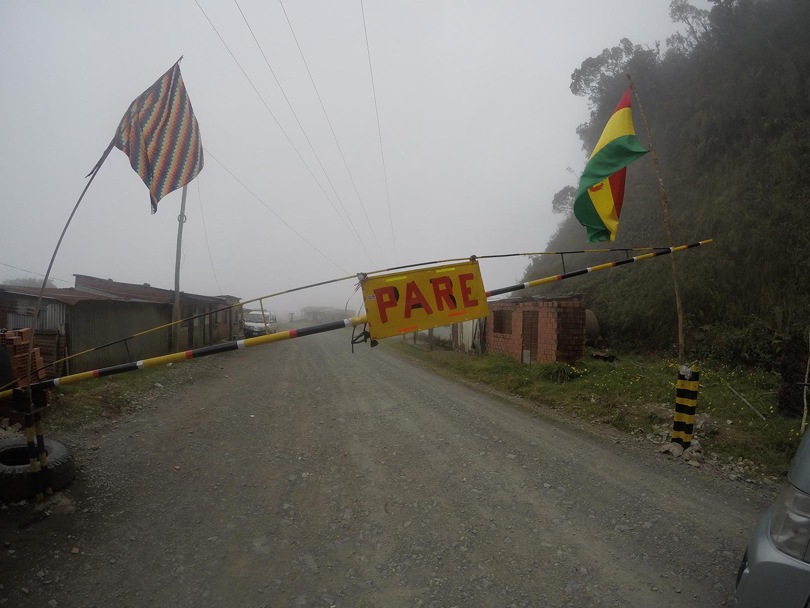 An outpost with closed gate while cycling Death Road in Bolivia. Cycling Death Road & Full Guide