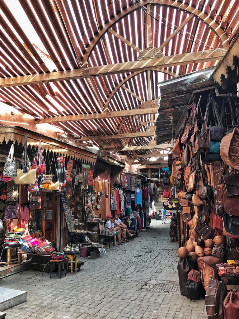 Shops in Marrakesh, Morocco. Being attacked by a man with a snake