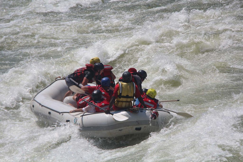 Shooting the rapids at Victoria Falls white water rafting in Zimbabwe, Africa. A bloodied nose, cracked rib and saving a life