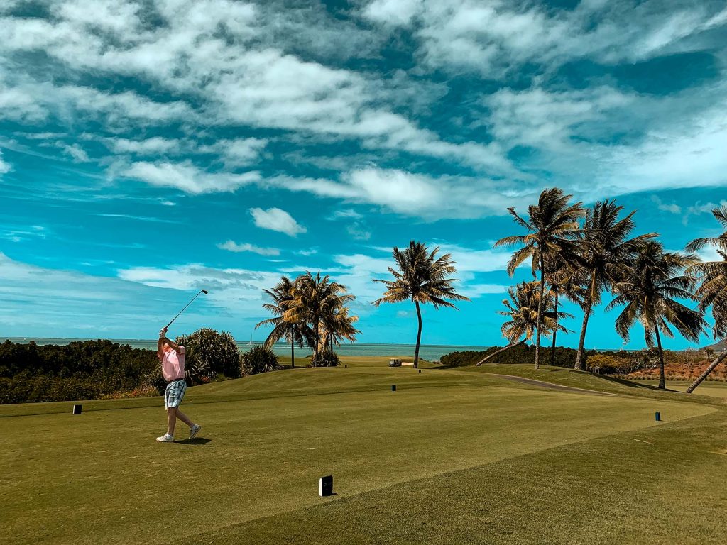 Dad playing golf in Mauritius, Africa. The best view of Mauritius