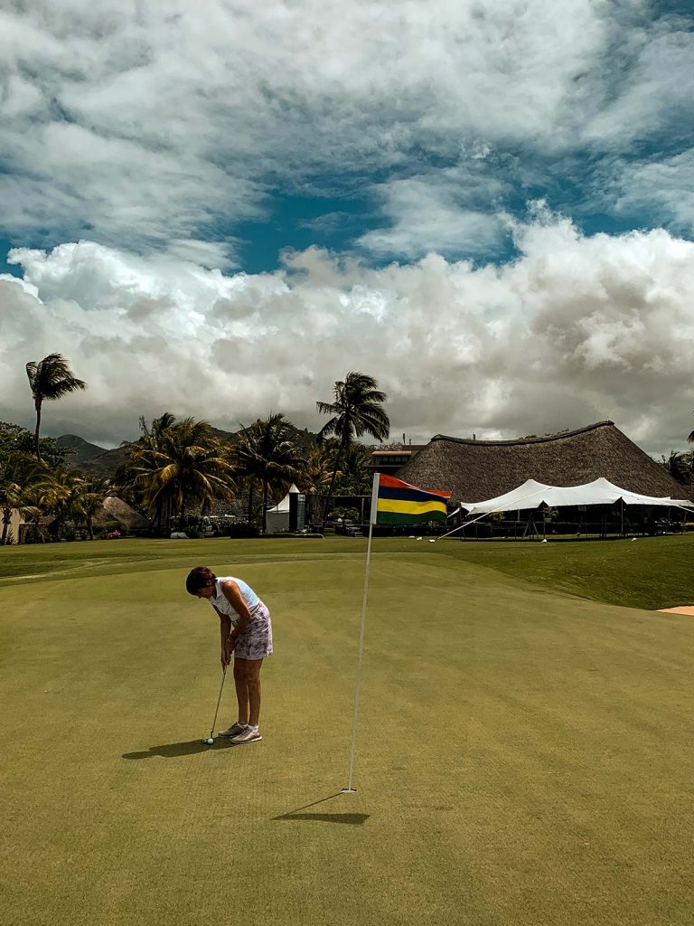 Mom playing golf in Mauritius, Africa. The best view of Mauritius